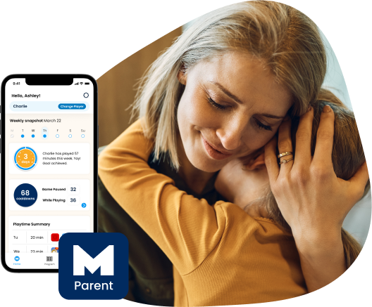 Mother holding kid and the Mightier app screenshot on the left side